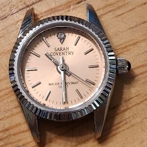 Sarah Coventry Silver and Pink Watch Face